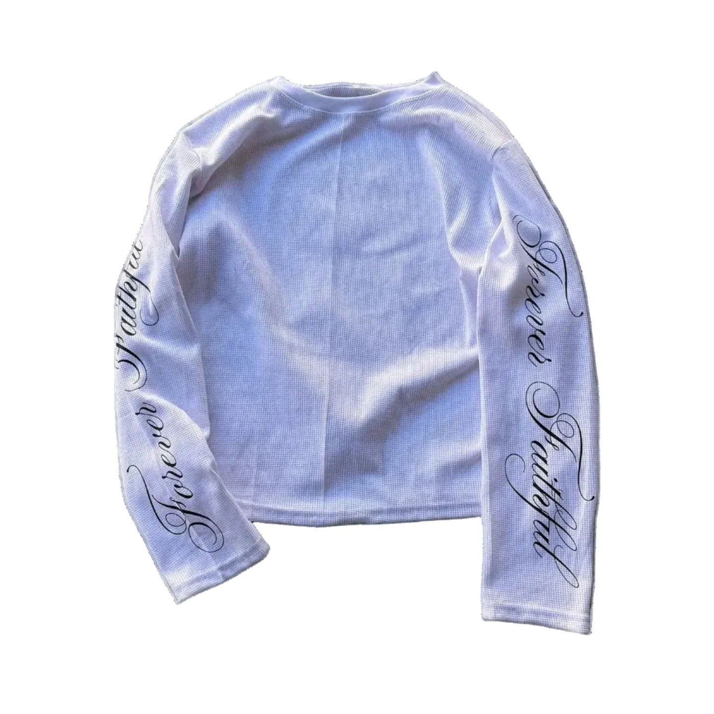 White long-sleeve shirt with black text on sleeves against a gray concrete background