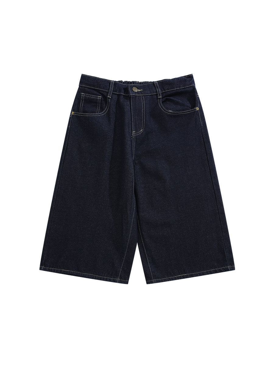 Black denim shorts on a white background
