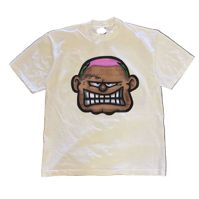 White t-shirt with a graphic design of a face with an angry expression on a textured brown background